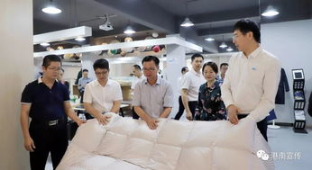 港南區區長到杭州招商 促進企業間合作 發展壯大羽絨產業